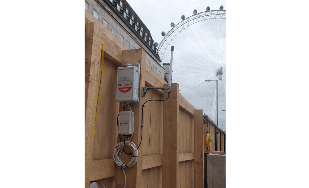 WI-SOS 480 Gateway mounted on site fence post with London Eye in the background