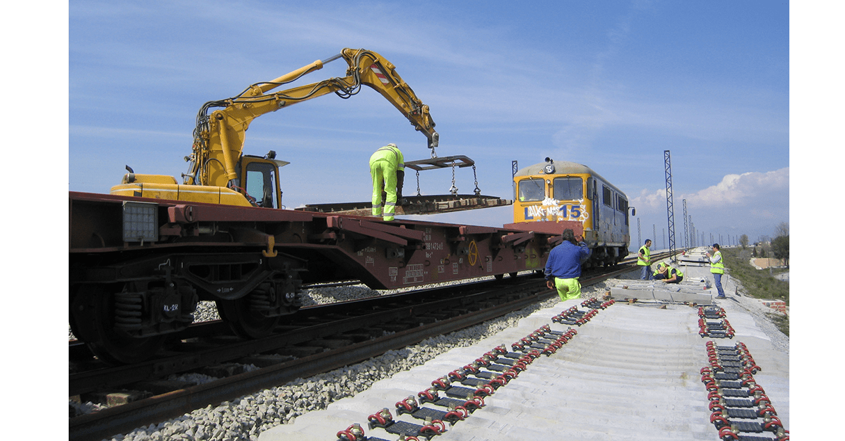 Engineers on rail track installing Total Pressure Cells