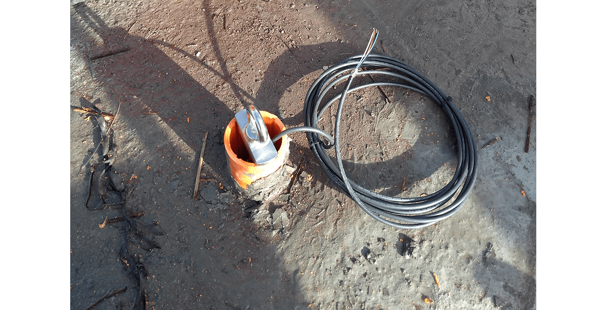 In-Place inclinometer hanger at top of casing with cable coil
