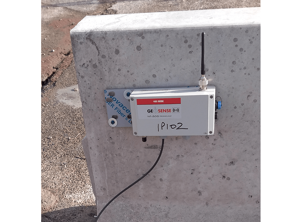 WI-SOS 480 Digital Node mounted on concrete wall connected to Geosense In-Place inclinometer