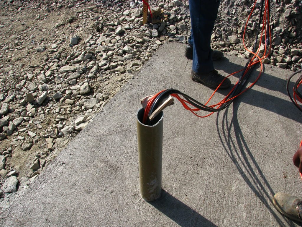 Routing of vibrating wire cables from VWLSS-200 plates once installed