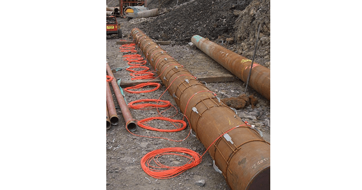 Tubular steel piles with VWS-2100 strain gaUGES ATTACHED WITH CABLE COILS ON GROUND