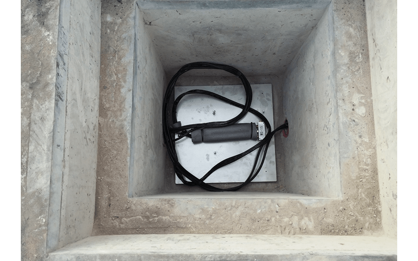 VWLLS-200 settlement plate in base of manhole